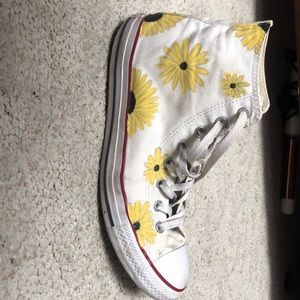 white converse with sunflowers